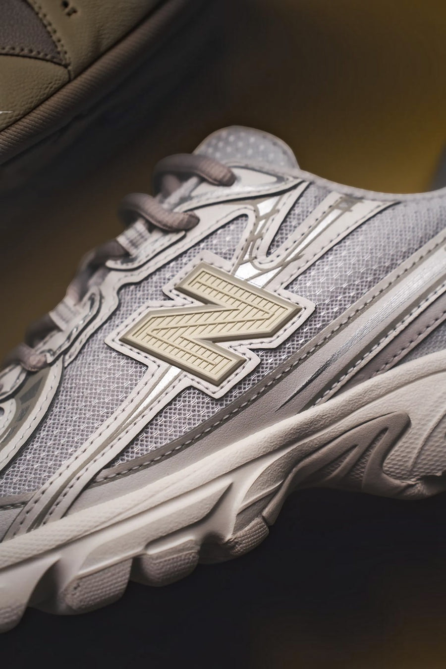 New Balance Women's 740 Sneaker in White, Silver Metallic, and Light Green