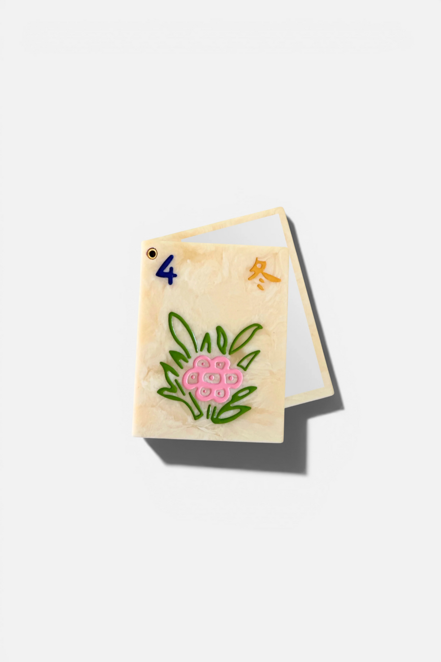 Solar Eclipse Mahjong Flower compact mirror in cream