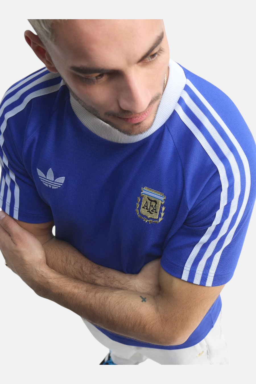 Chest trefoil and AFA crest detail on Adidas Argentina Originals Tee in Lucid Blue