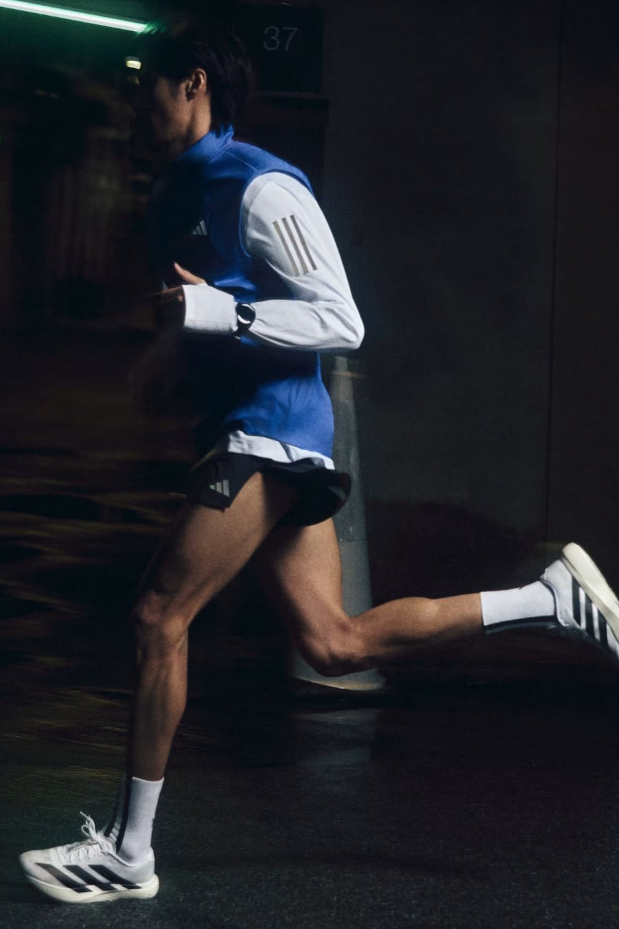 Adidas Adizero Evo SL Shoes in Cloud White / Core Black / Cloud White