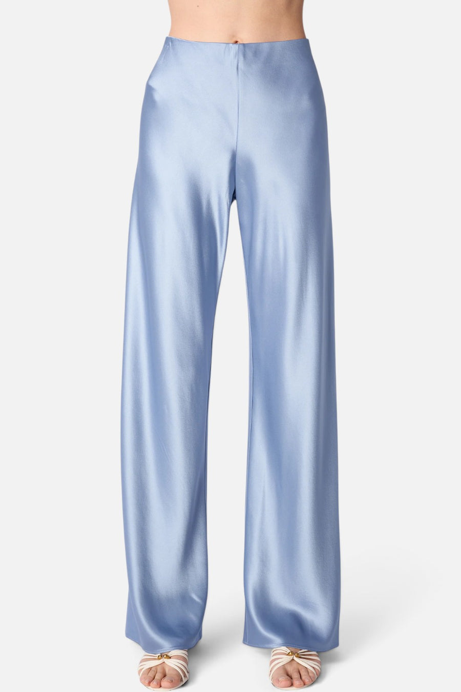 Cami NYC Bristol mid-rise satin pant in mist blue with a relaxed leg, on model.