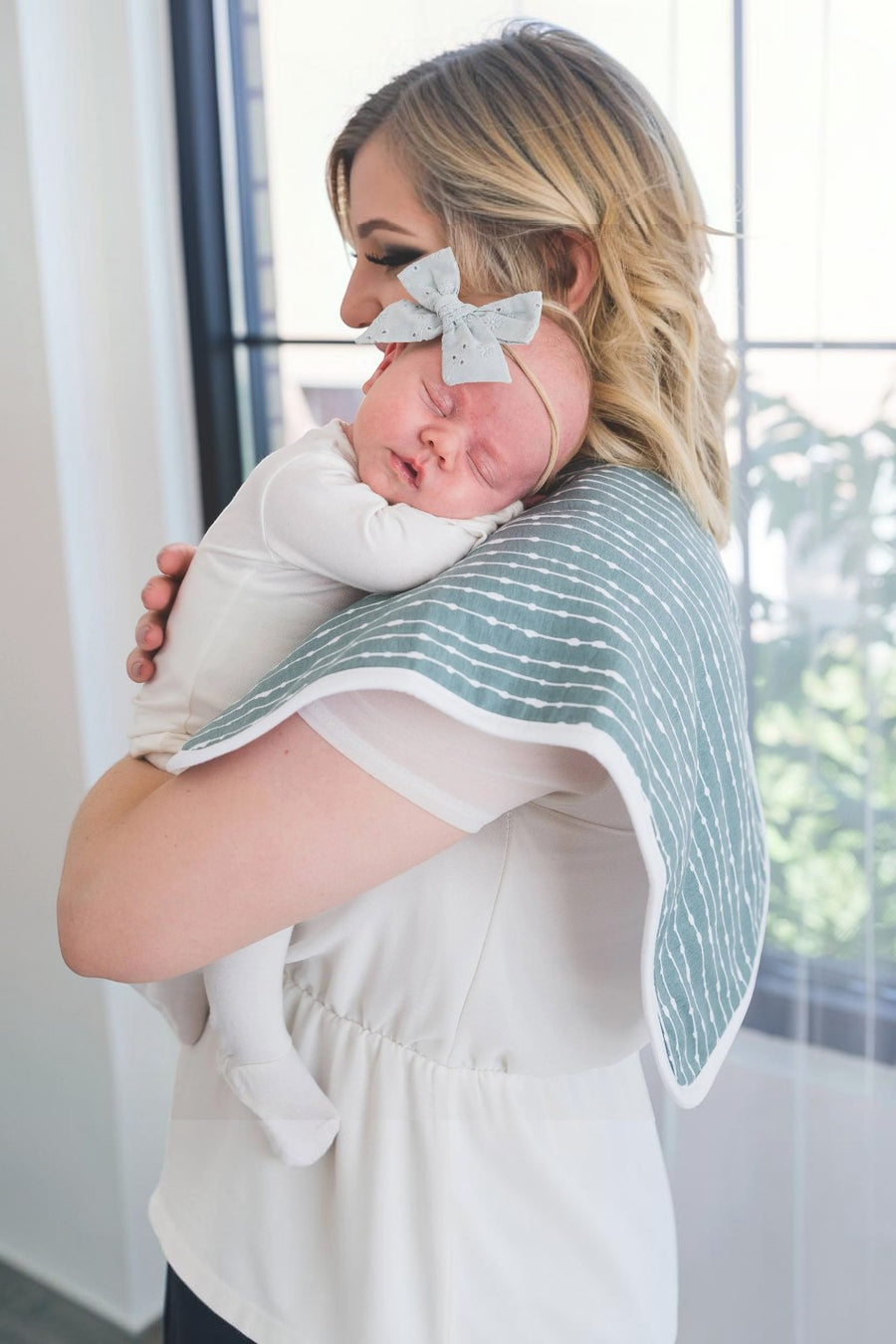 Copper Pearl Autumn burp cloth shown draped over a shoulder.