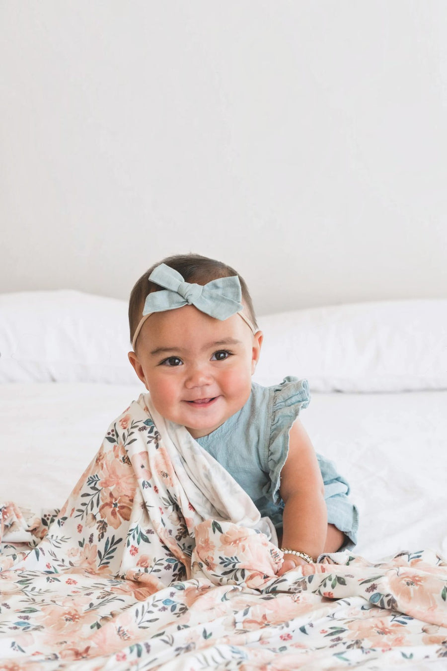 Copper Pearl Autumn swaddle blanket styled in a nursery.