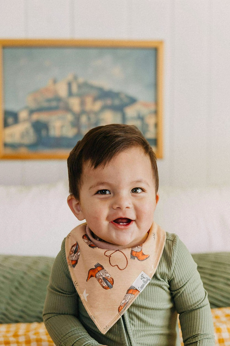 Copper Pearl Boone baby bandana bibs, folded stack.