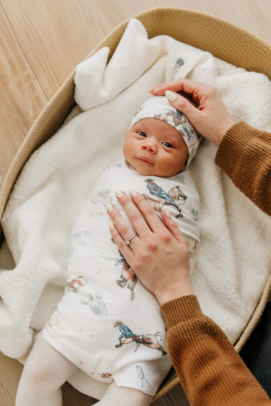 Copper Pearl Boone swaddle blanket, folded.