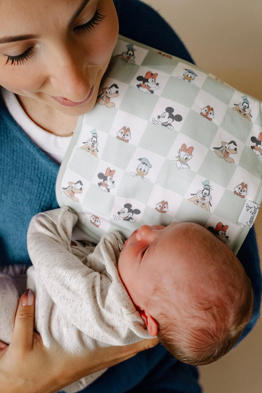 Copper Pearl Mickey Mouse burp cloths, folded stack.