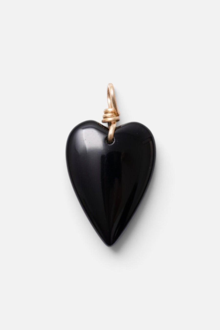 Farrah B gemstone heart charm in polished black stone with gold wire-wrapped bail
