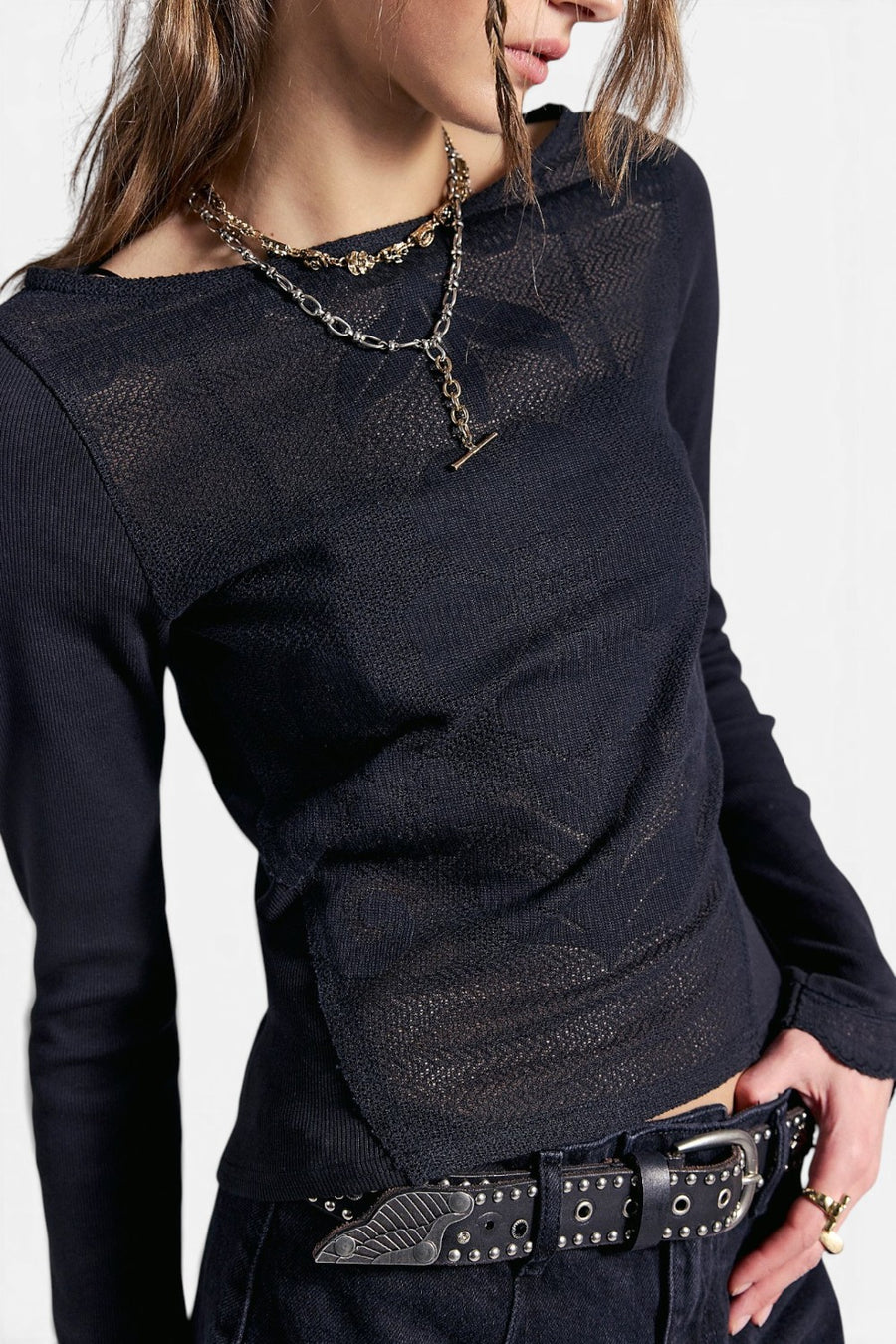 Free People Delilah long sleeve top in black, front view.