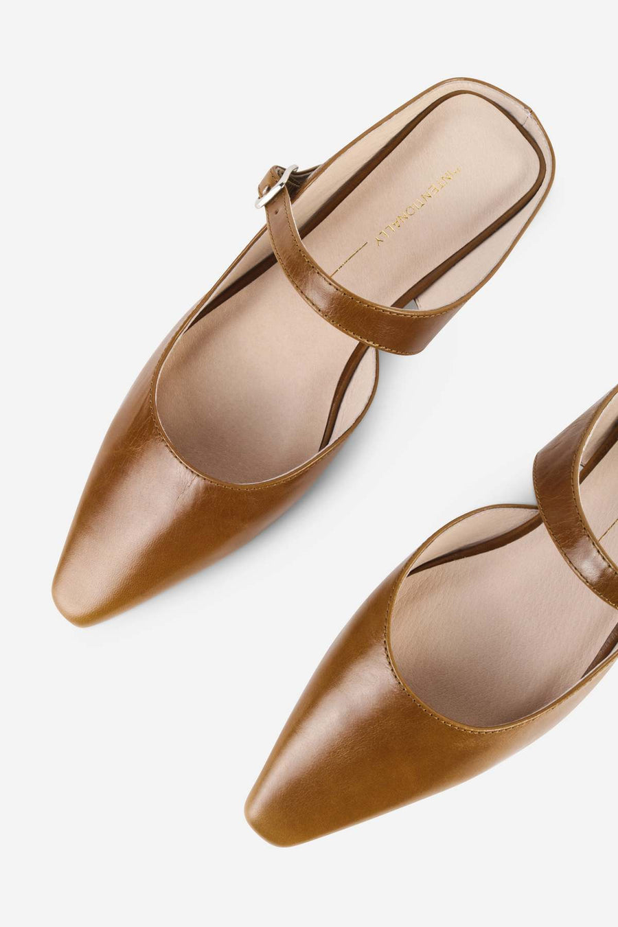 Intentionally Blank Nona saddle leather mule in tan, top view showing cutout.