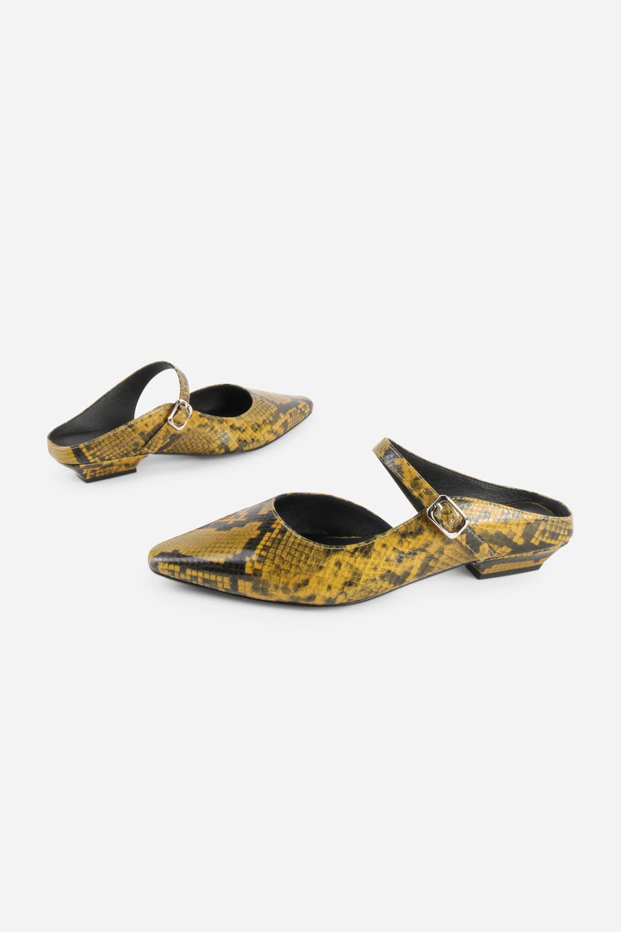 Intentionally Blank Nona snake embossed leather mule in yellow, side view.