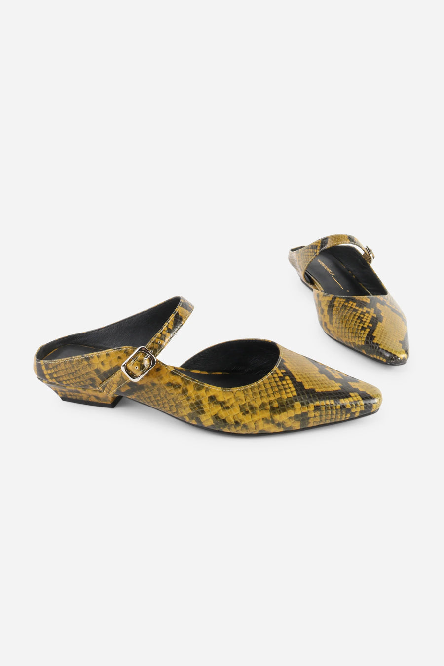 Intentionally Blank Nona snake embossed leather mule in yellow, top view showing cutout.