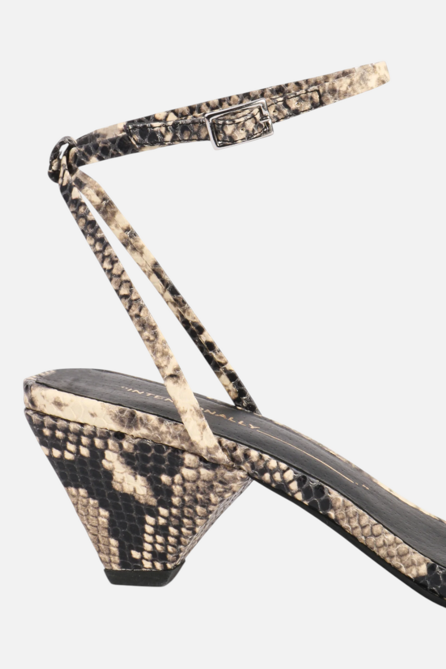 Intentionally Blank Pretty Please Snake Heeled Sandal in Black and White