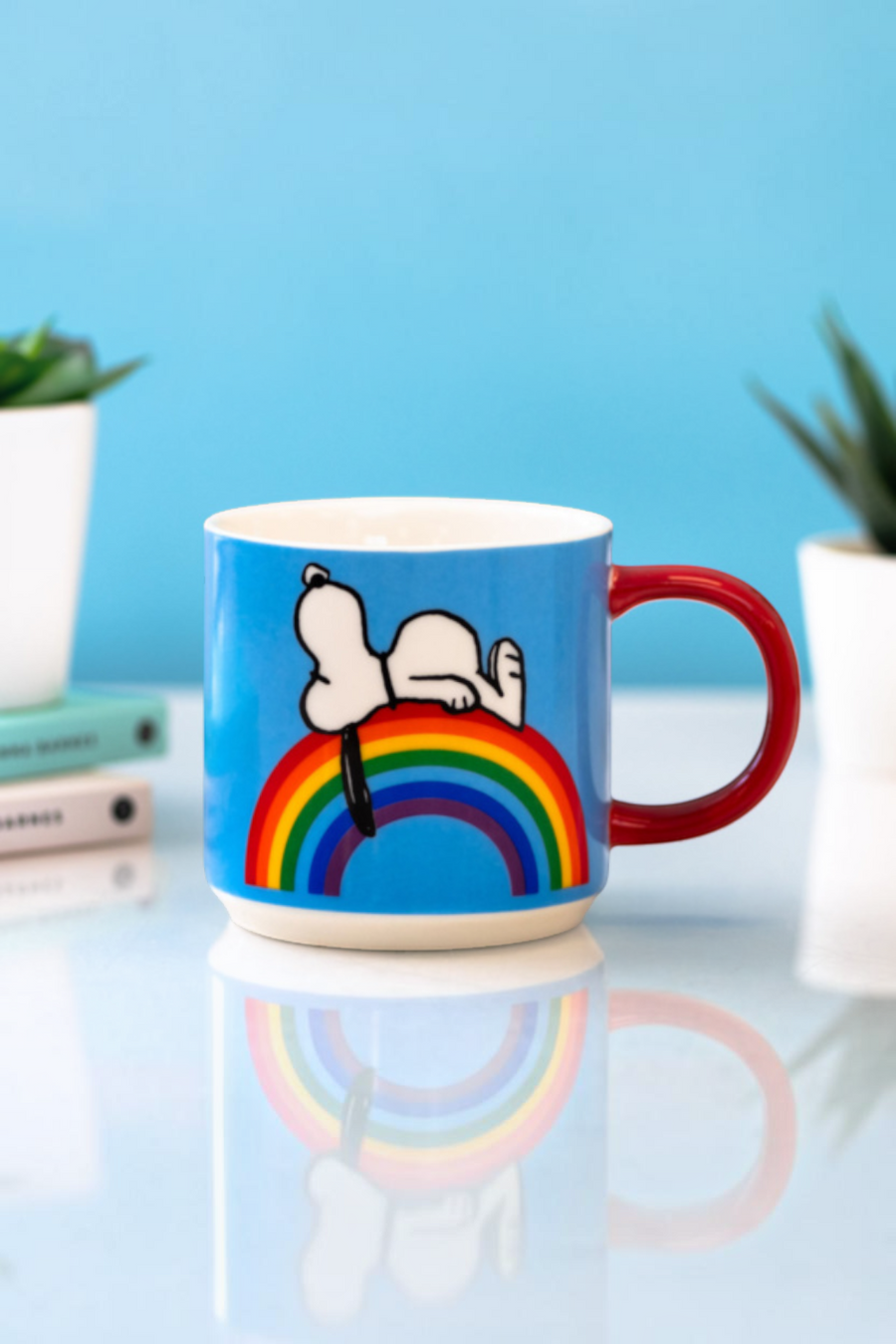 Magpie Peanuts Good Vibes mug in blue — handle view