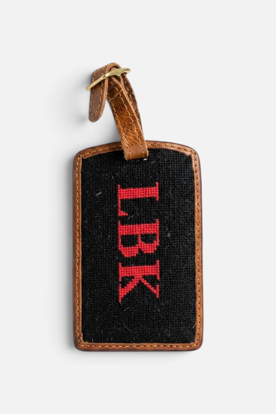 Smathers & Branson LBK luggage tag in red needlepoint on black with Italian leather strap.