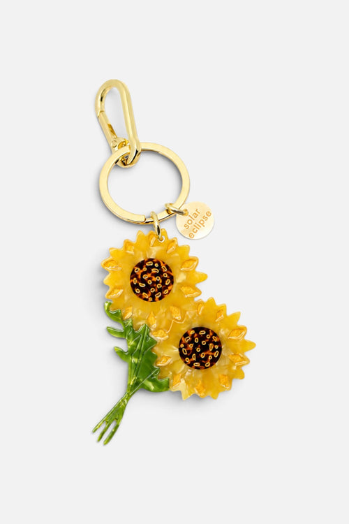 Solar Eclipse hand-painted sunflower stem bag charm with carabiner clip.