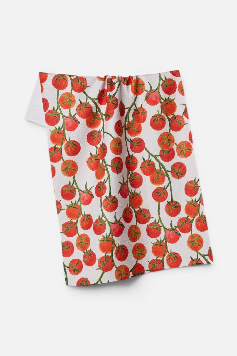 Geometry Ripe and Ready tea towel with produce print, flat lay.
