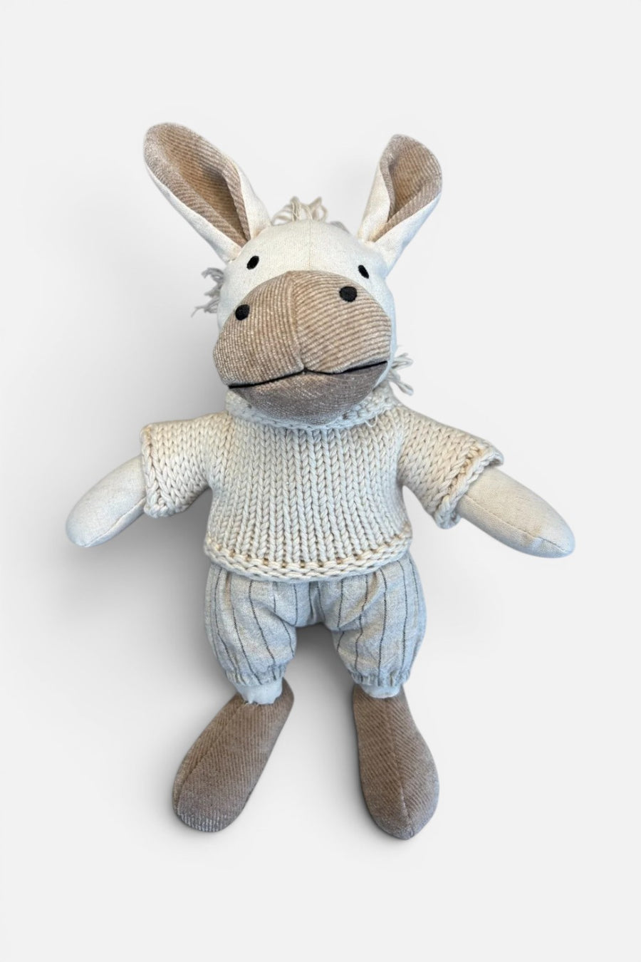 The Little Dog Laughed Cedric donkey plush toy, front view.
