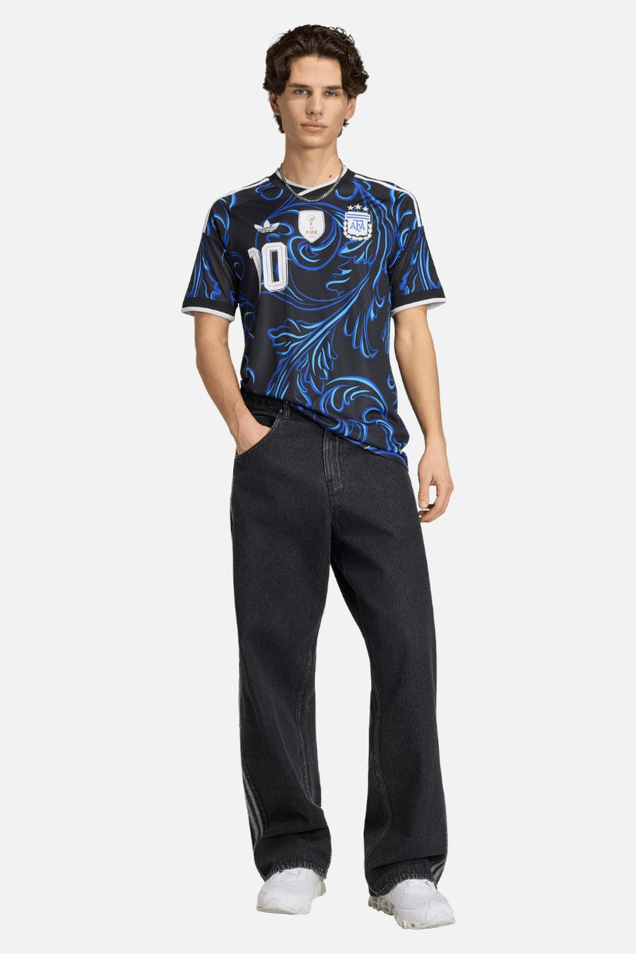 Adidas Argentina 26 Away Messi #10 Jersey in Black & Lucid Blue styled with black denim — full body