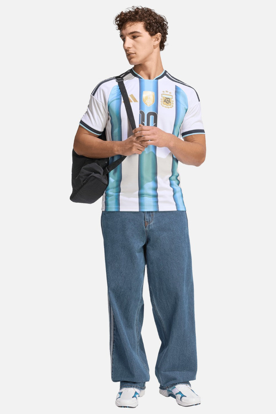 Adidas Argentina 26 Home Messi #10 Jersey in White & Blue styled with black denim — full body