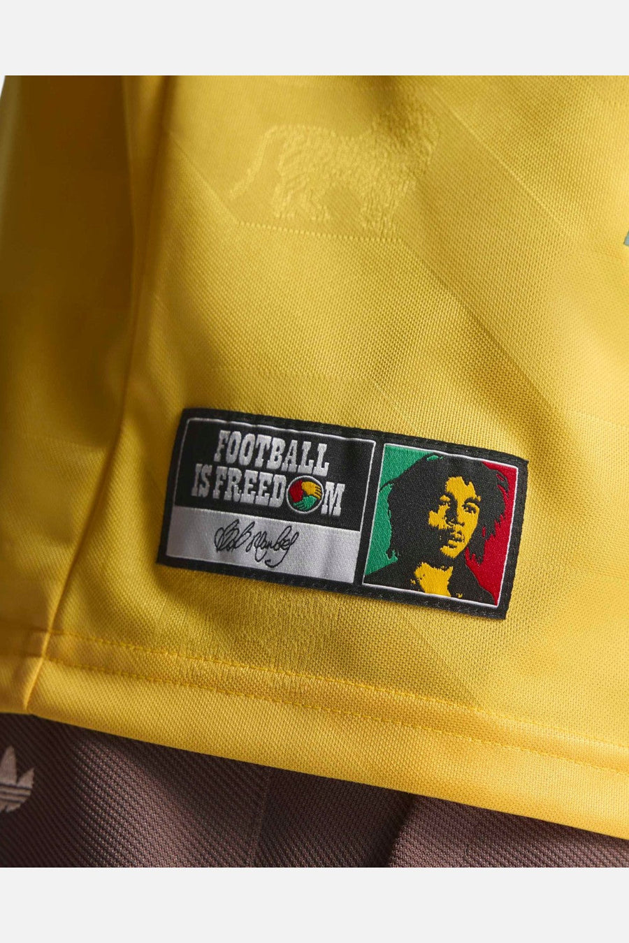 Adidas Jamaica x Bob Marley Originals Jersey in Bold Gold – flat lay