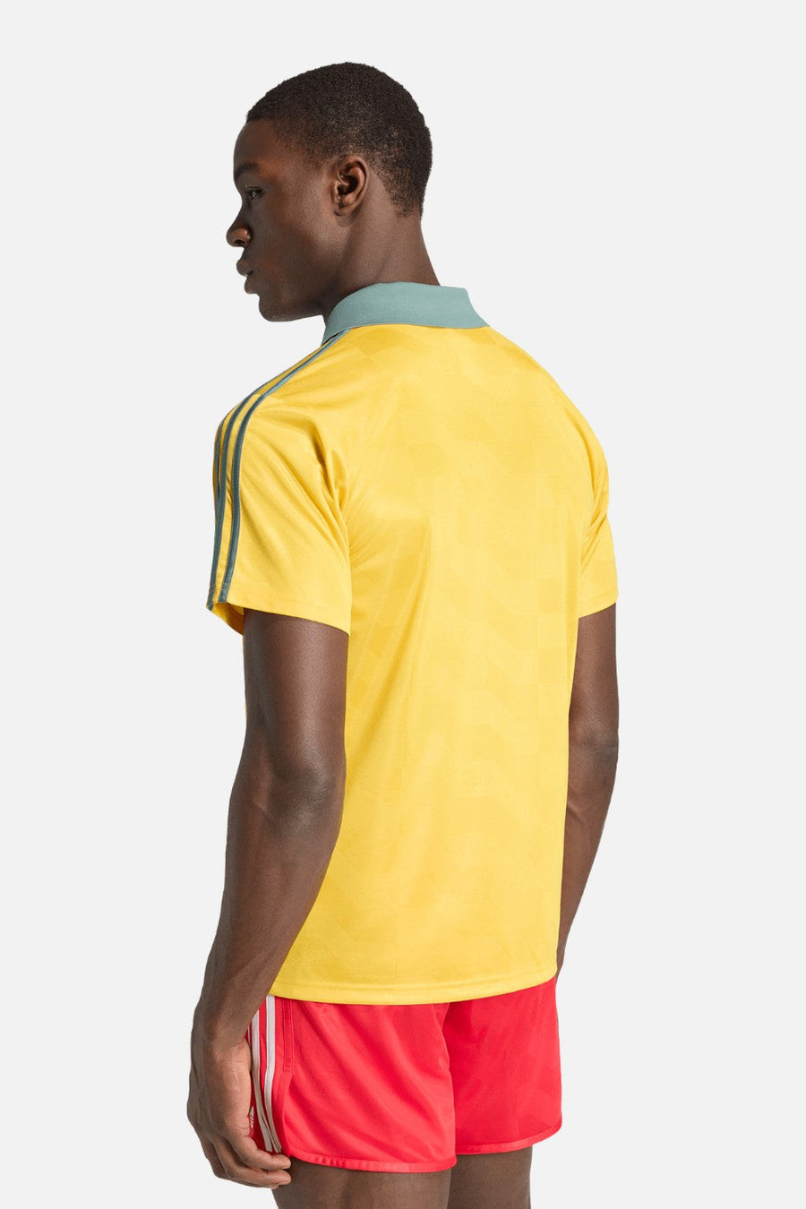 Adidas Jamaica x Bob Marley Originals Jersey in Bold Gold – side view