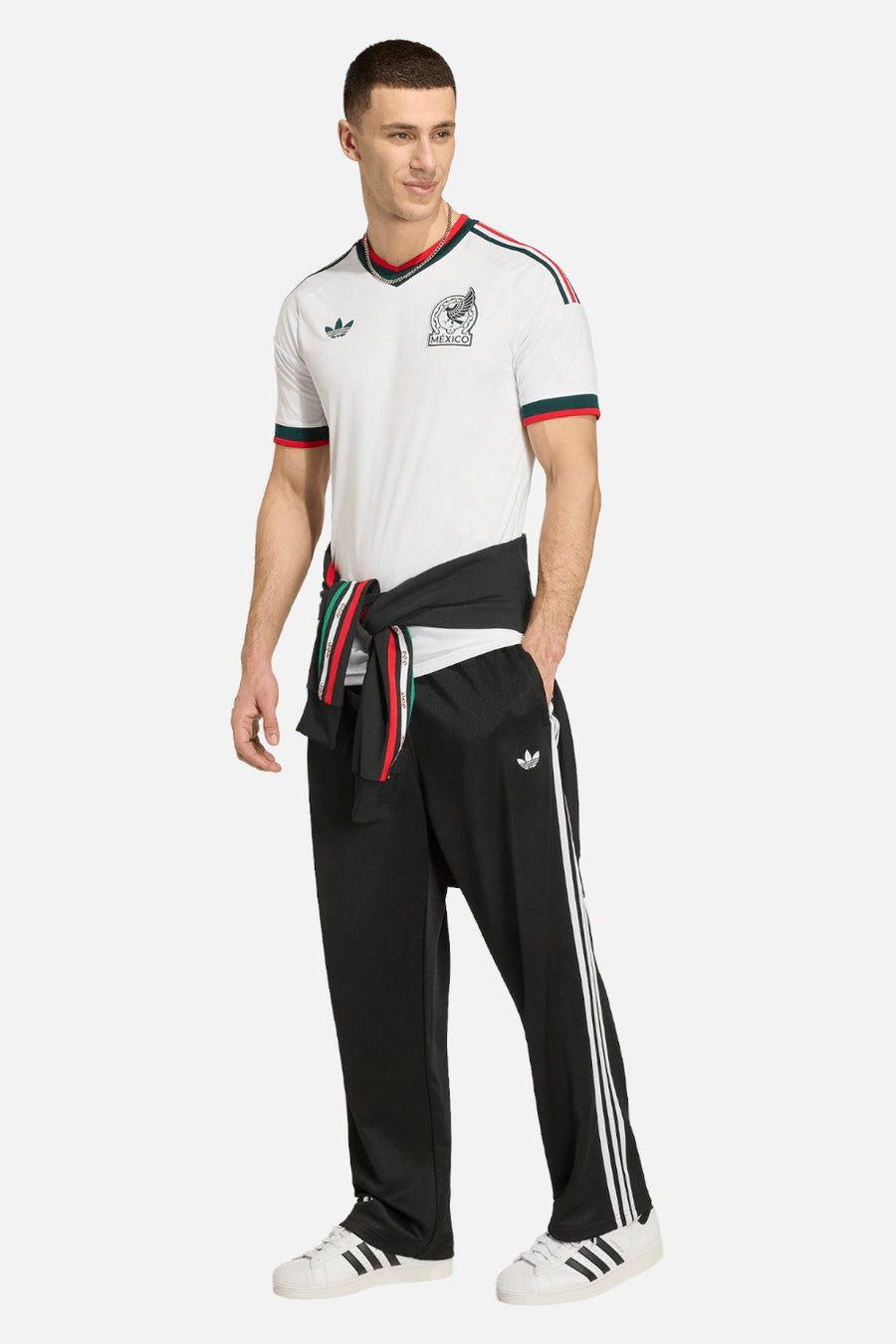 Adidas Men's Mexico 26 Away Jersey in White styled with black denim — full body