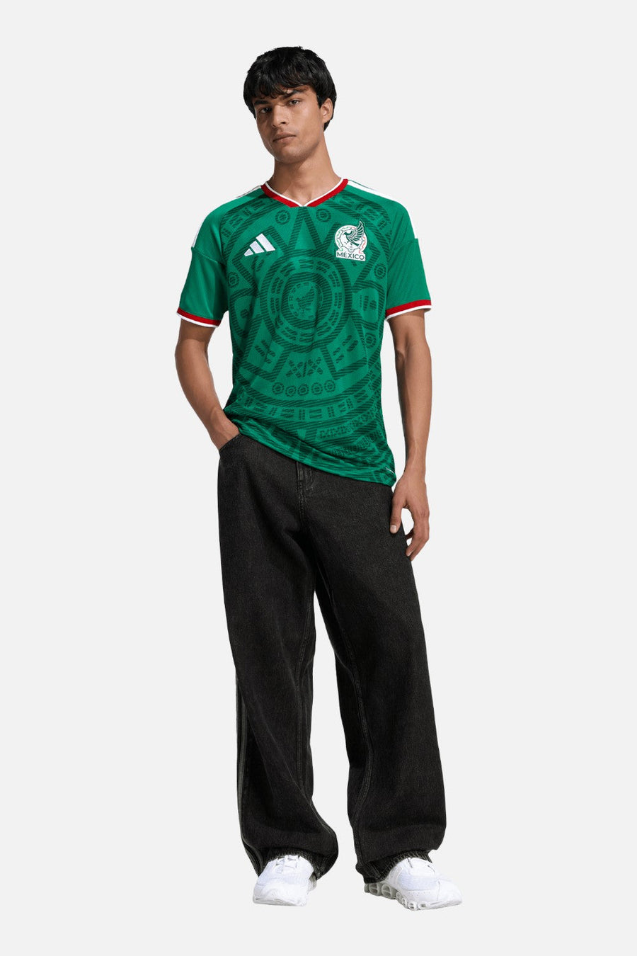 Adidas Mexico 26 Home Jersey in Bold Green styled with black denim — full body