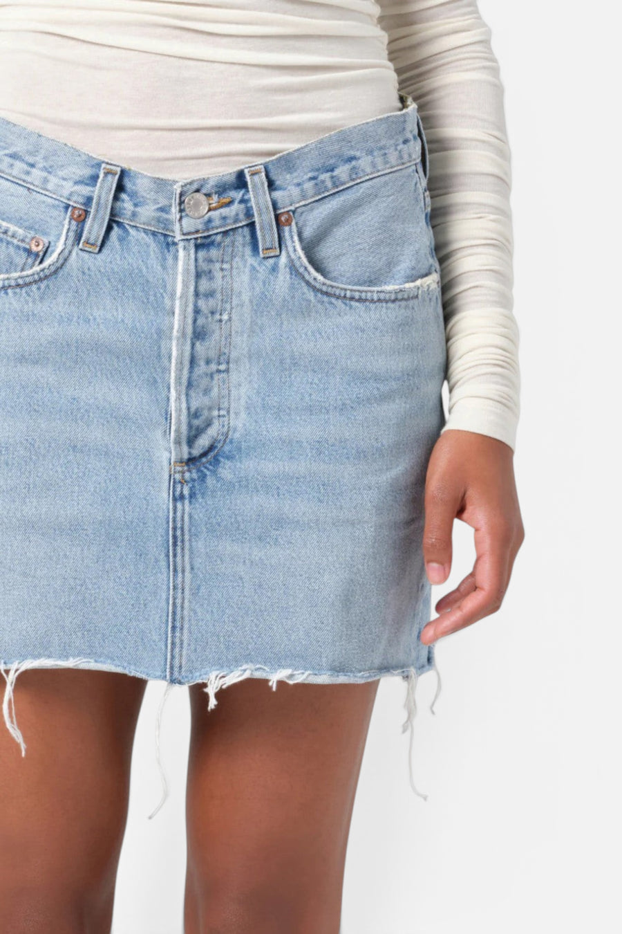 Agolde V-Waist Mini Skirt in Force – flat lay