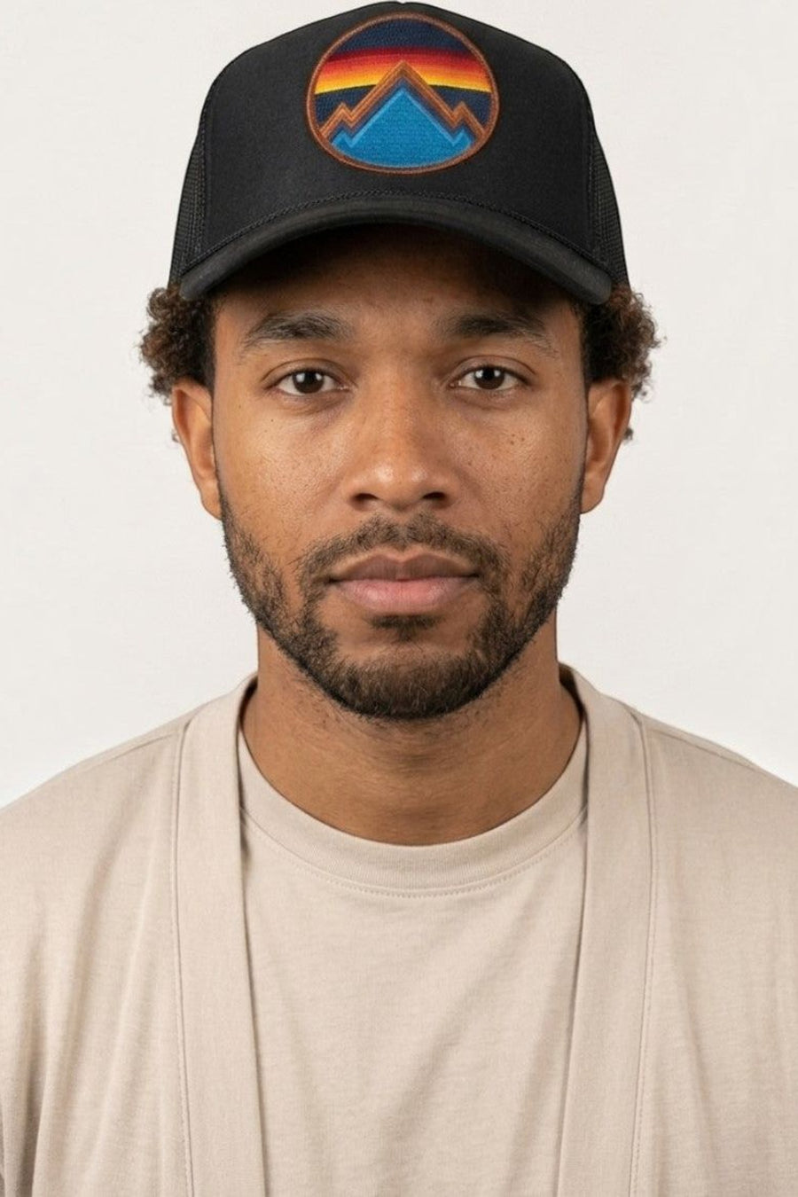 Aviator Nation All Seasons Circle Trucker Hat in Black – flat lay