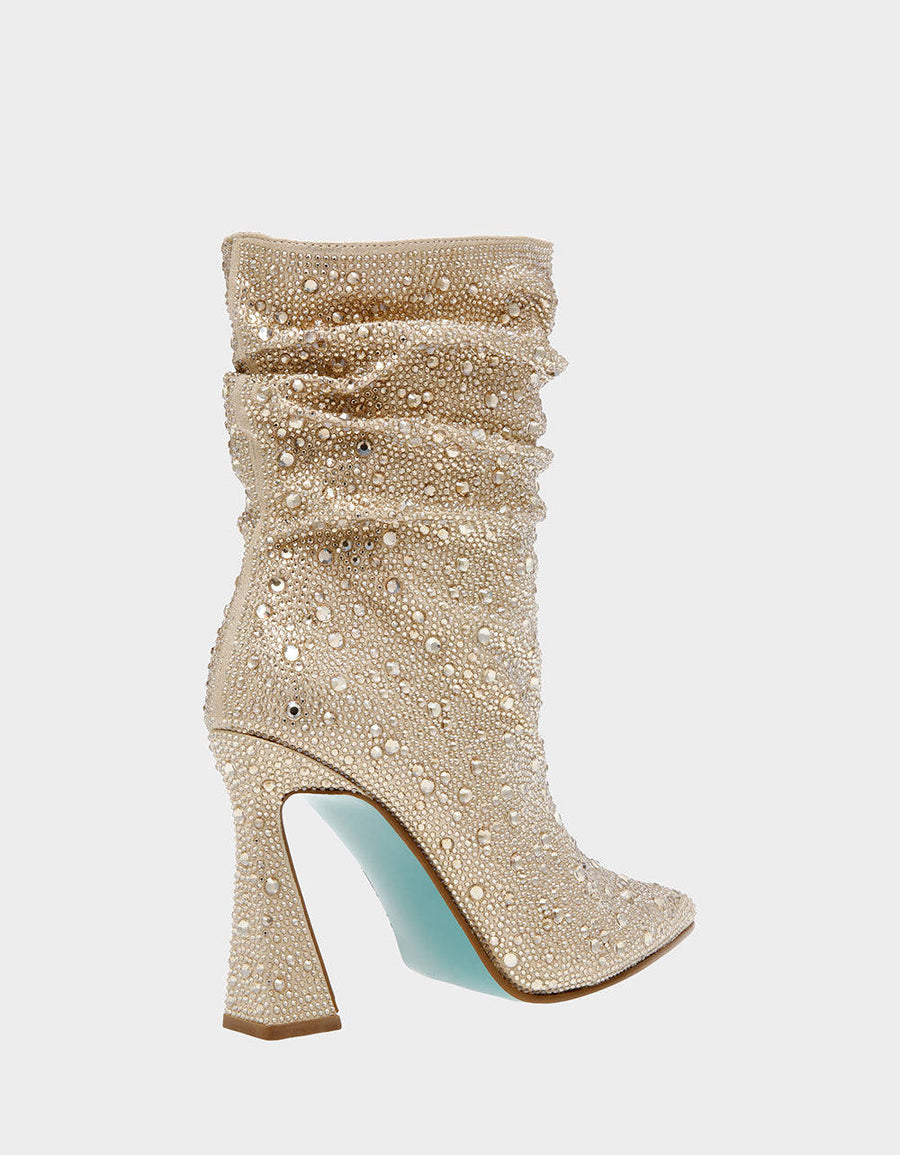 Betsey Johnson Mac Bootie in Light Gold – flat lay