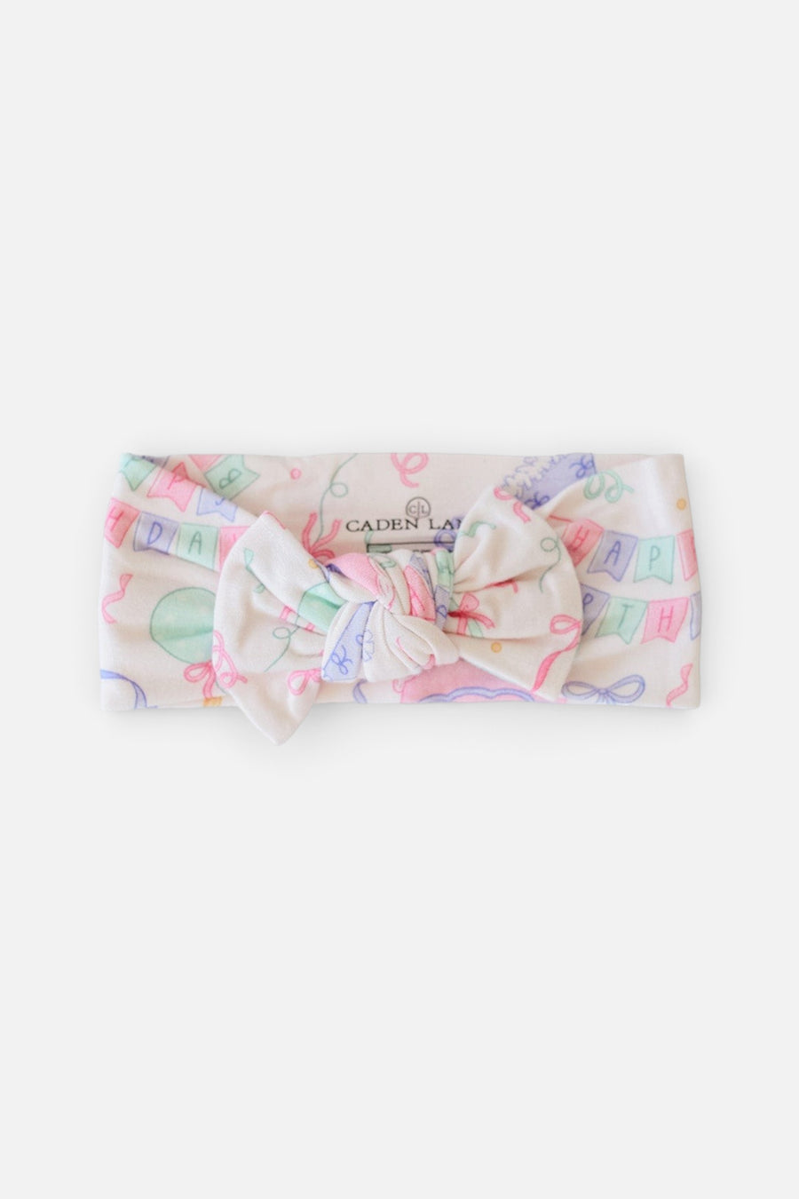 Caden Lane Knit Large Bow Headwrap in Birthday Bash Pink – flat lay