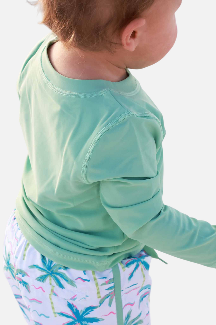 Caden Lane Long Sleeve Rash Guard in Tropical Green – side view