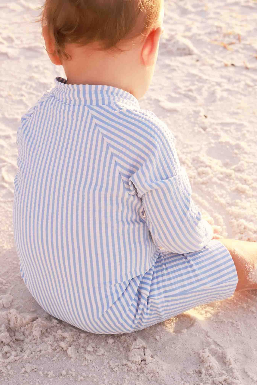Caden Lane Long Sleeve Swim Romper in Blue Seersucker – detail