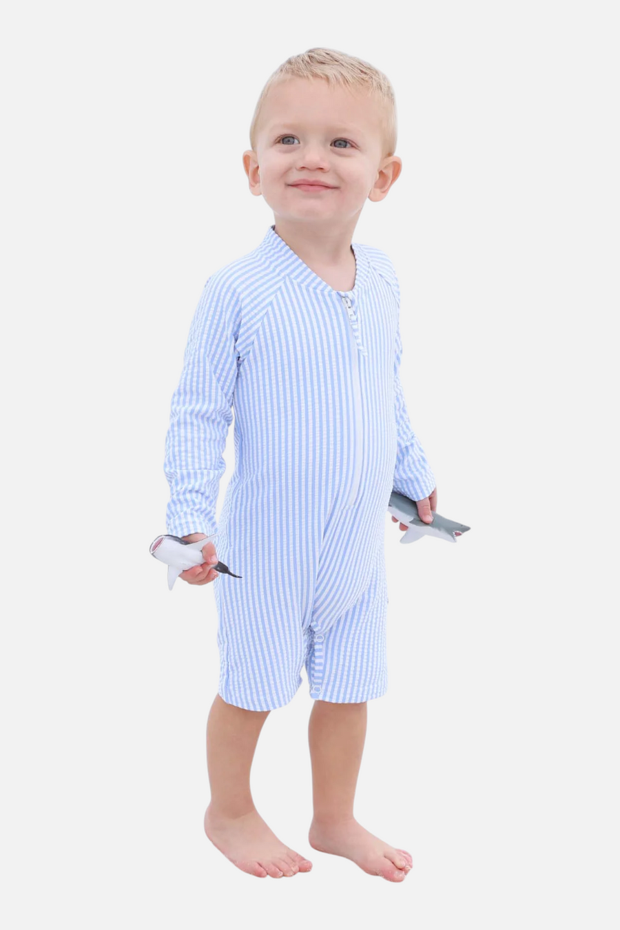 Caden Lane Long Sleeve Swim Romper in Blue Seersucker – front view