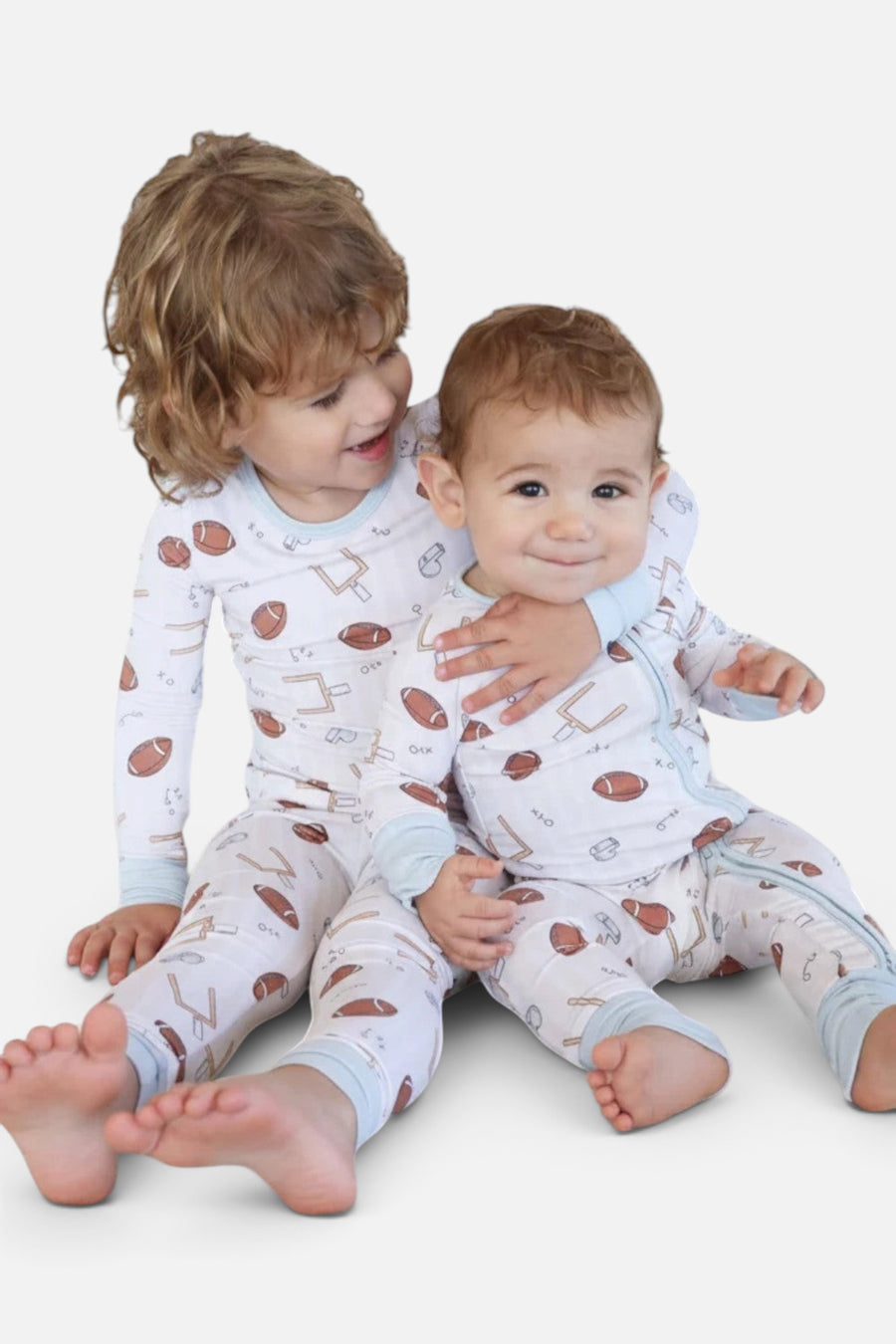 Caden Lane Tiny Touchdowns Convertible Zip Romper – flat lay