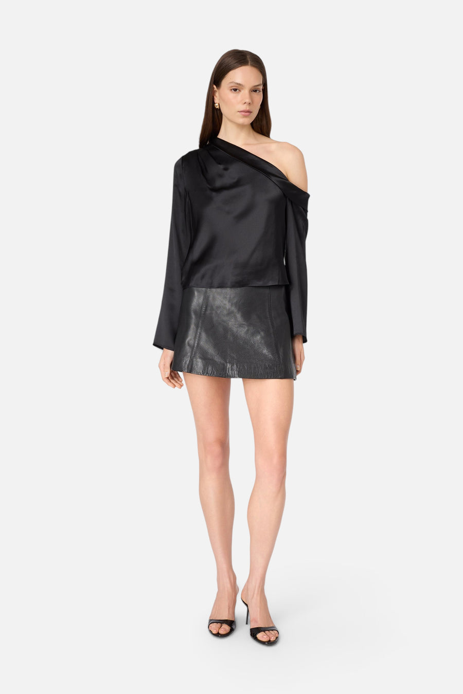CAMI NYC Celeste Asymmetrical Top in Black – flat lay