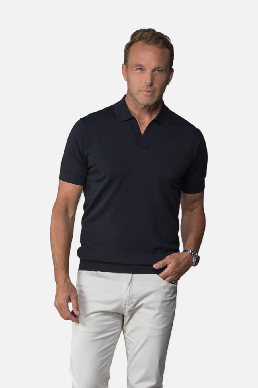 Collars & Co Maranello Mid-Weight Cotton & Silk Buttonless Polo in Black – flat lay
