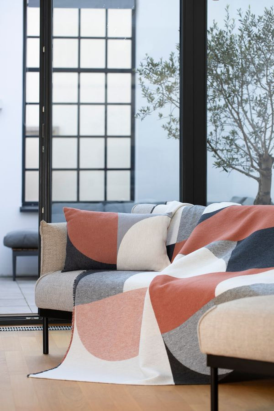 David Fussenegger Luca Throw in Modular Forms Copper/Charcoal – alternate