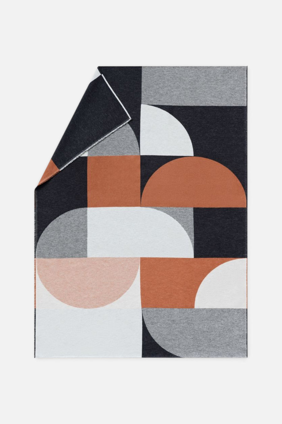 David Fussenegger Luca Throw in Modular Forms Copper/Charcoal – front view