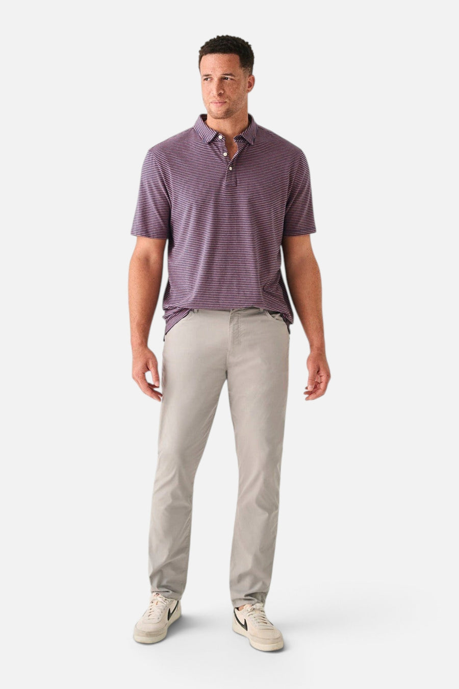 Faherty Movement™ Short-Sleeve Polo in Spring Storm Stripe – side view