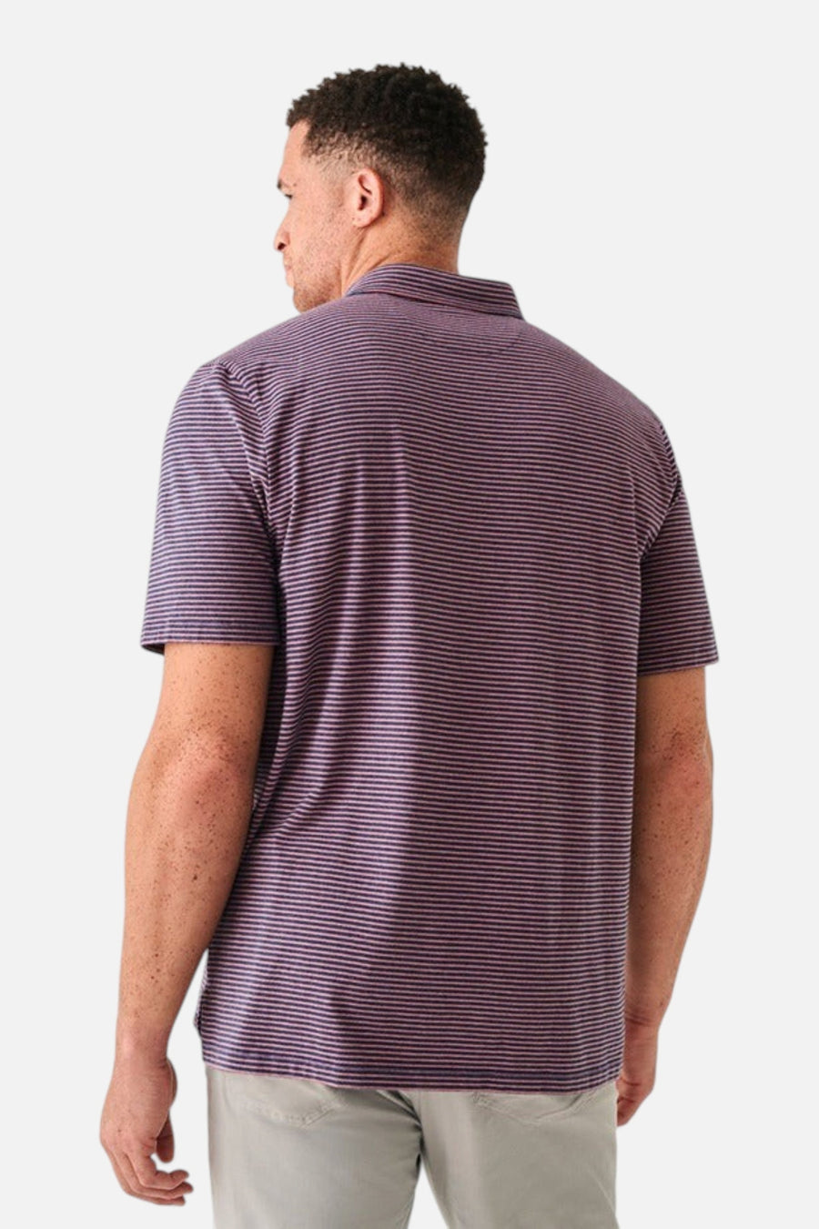Faherty Movement™ Short-Sleeve Polo in Spring Storm Stripe – side view