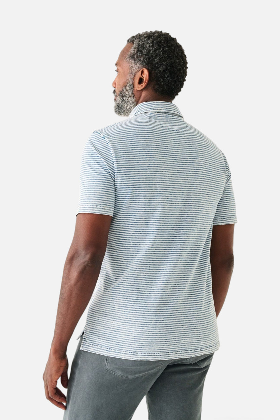 Faherty Short Sleeve Indigo Polo in Salt Wash Indigo Stripe – side view
