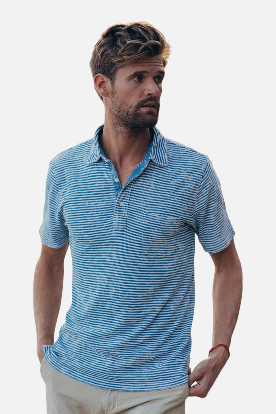 Faherty Short Sleeve Indigo Polo in Salt Wash Indigo Stripe – on model