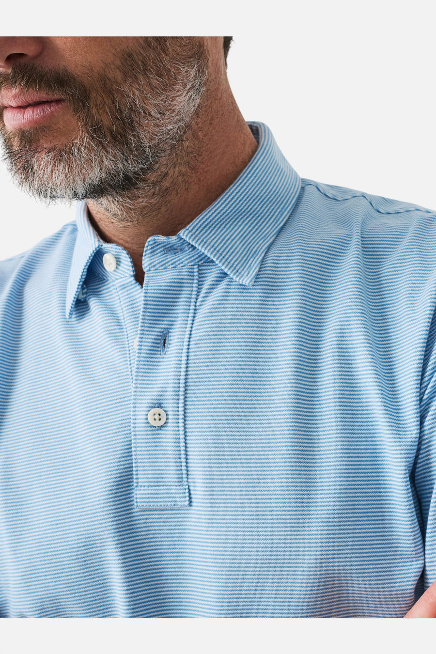 Faherty Short-Sleeve Movement™ Pique Polo in Clean Lake Feeder – side view