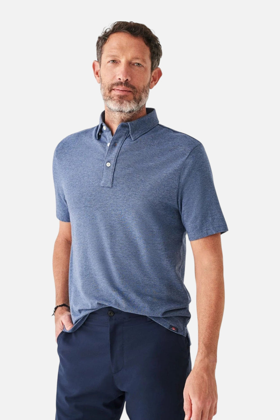 Faherty Short Sleeve Movement Polo in Sea Navy Melange – side view
