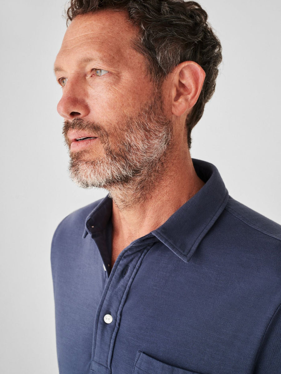 Faherty Sunwashed Tshirt Polo in Dune Navy – side view