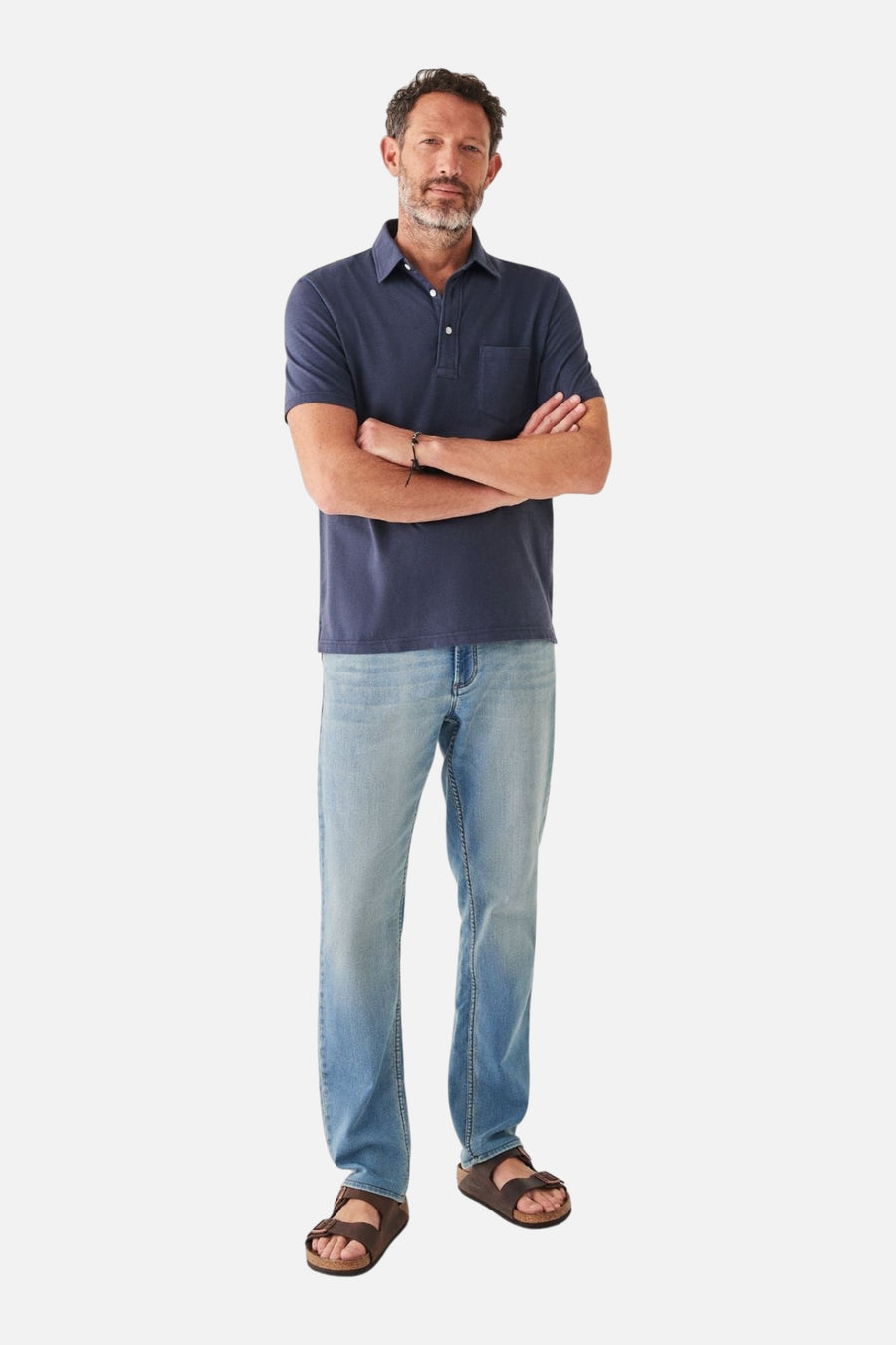 Faherty Sunwashed Tshirt Polo in Dune Navy – side view