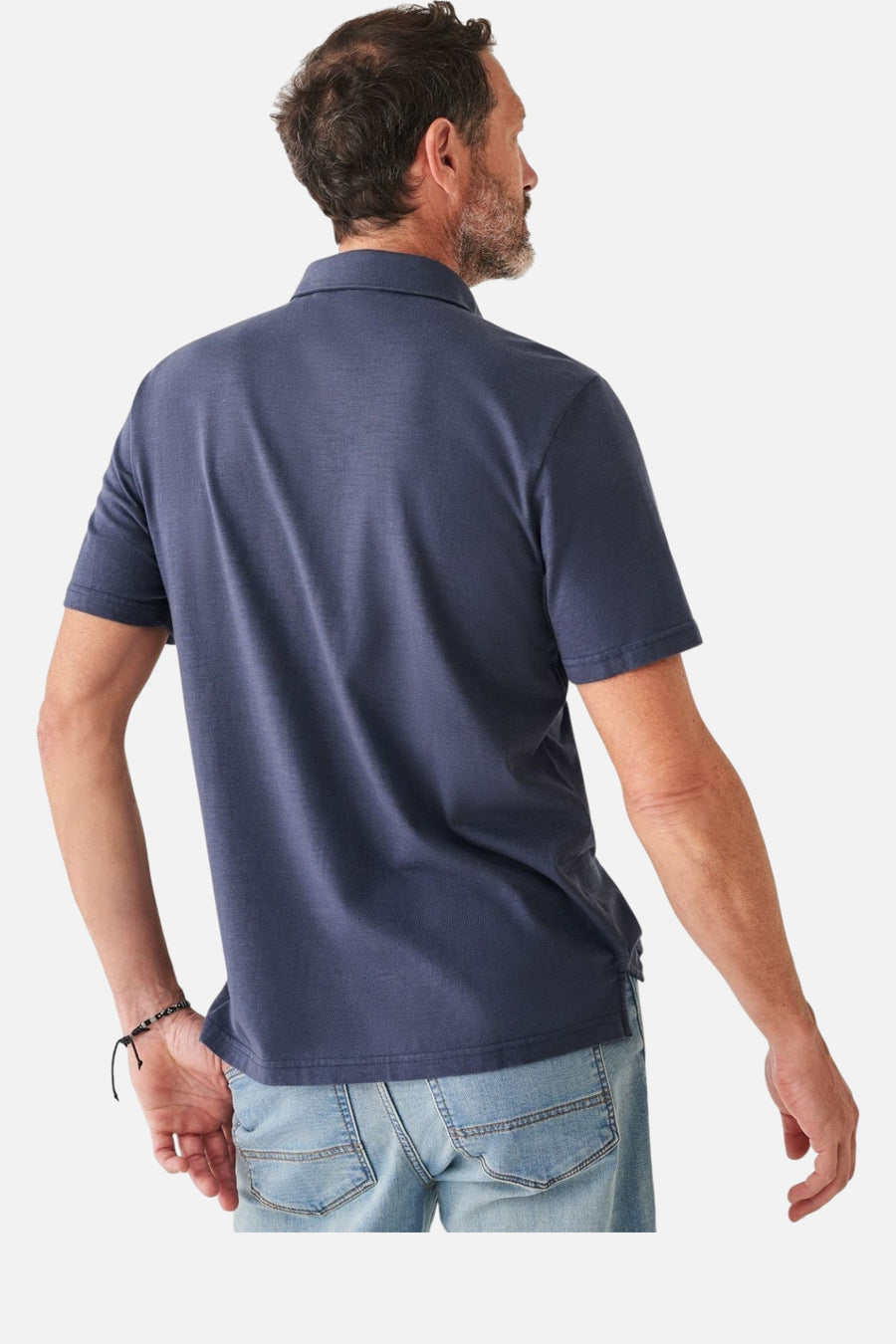 Faherty Sunwashed Tshirt Polo in Dune Navy – side view