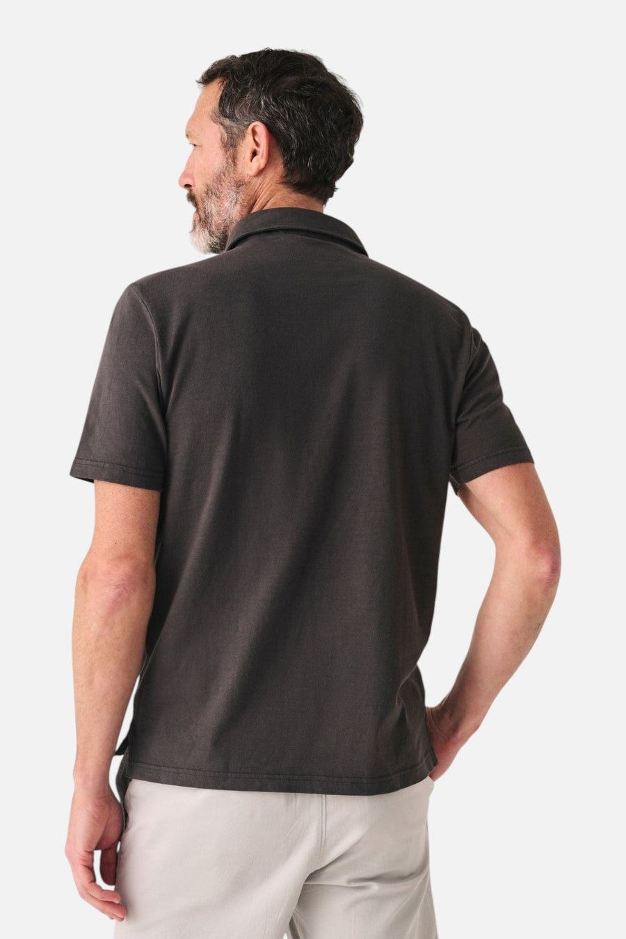 Faherty Sunwashed Tshirt Polo in Washed Black – side view