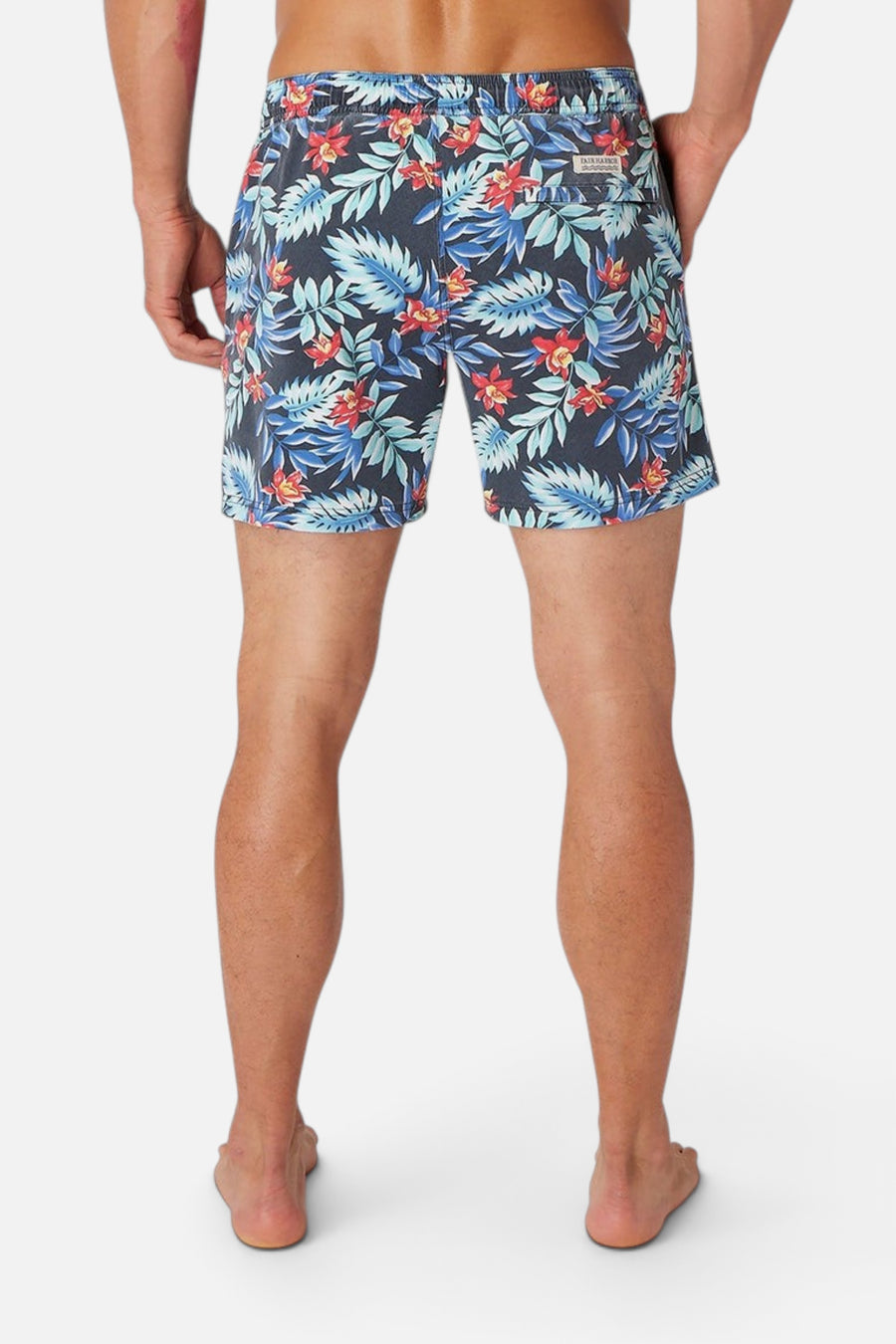Fair Harbor Bungalow Swim Trunks in Midnight Palms – flat lay